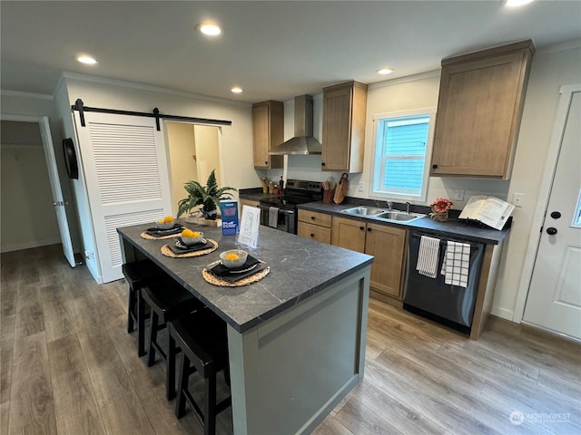 kitchen with wall chimney exhaust hood, a barn door, electric range, dishwasher, and a center island