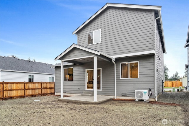 rear view of house with entry steps, a patio, fence, crawl space, and ac unit