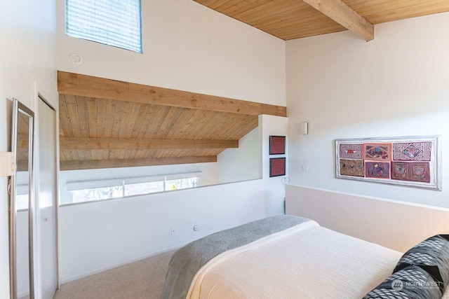 bedroom featuring wooden ceiling, carpet flooring, and vaulted ceiling with beams