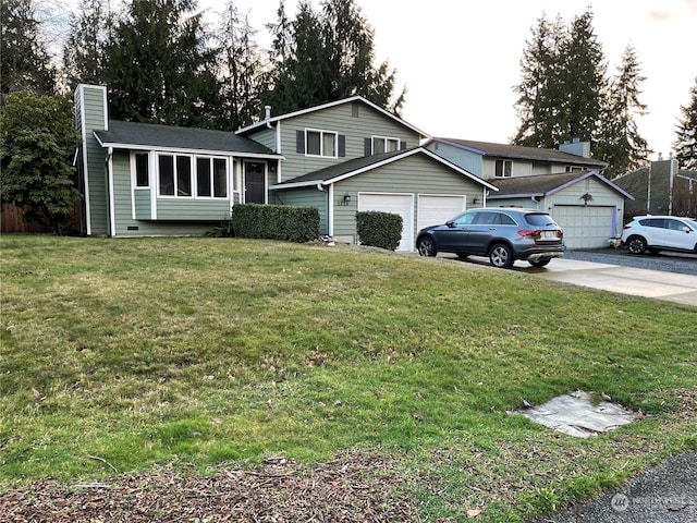 split level home with a front yard