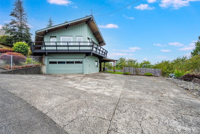 view of property exterior with a garage