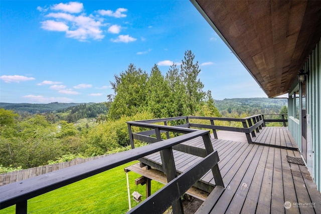 deck featuring a lawn