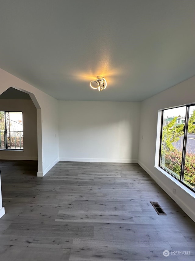 unfurnished dining area with hardwood / wood-style floors