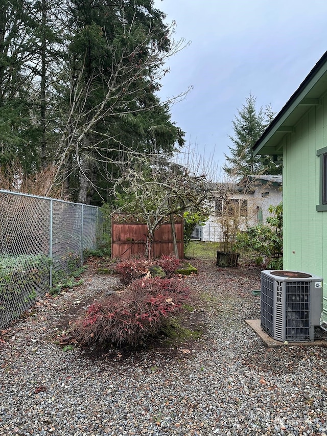 view of yard featuring central AC unit