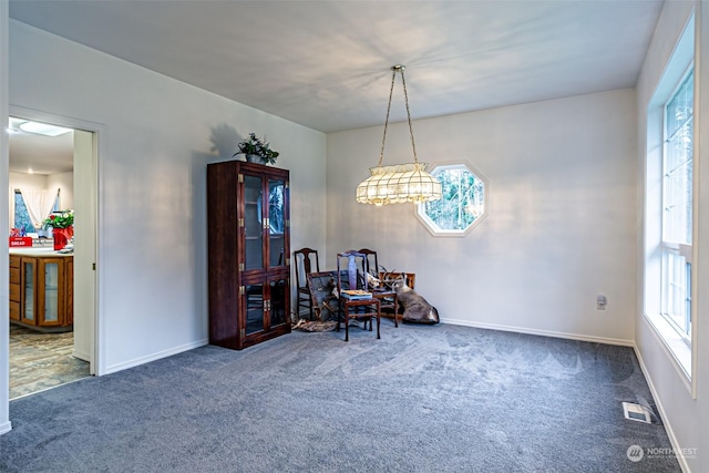 view of carpeted dining room