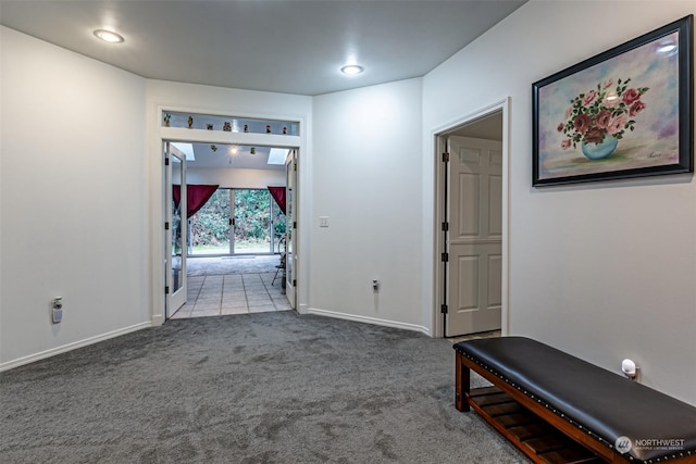 view of carpeted foyer