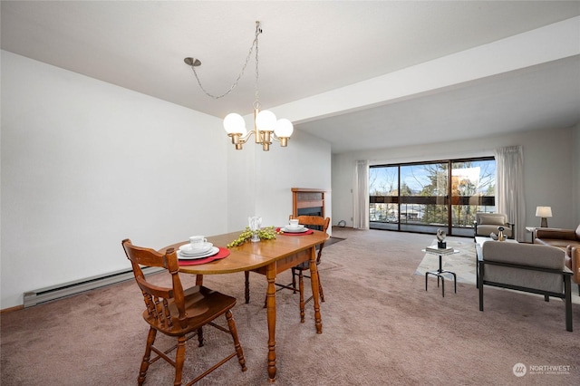 carpeted dining room with a notable chandelier and baseboard heating