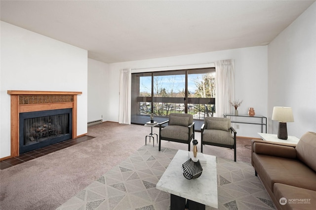 carpeted living room with a baseboard heating unit