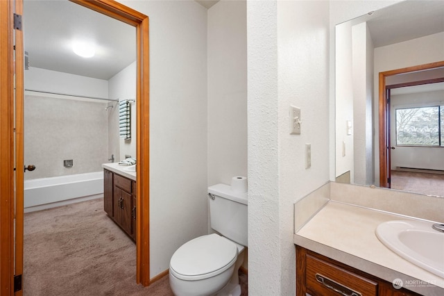 bathroom featuring a shower, vanity, and toilet