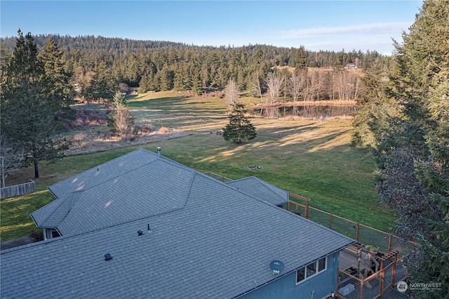 aerial view with a wooded view