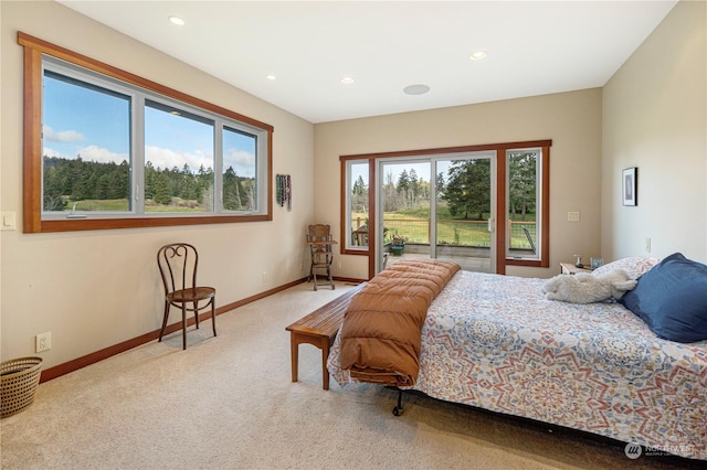 carpeted bedroom with recessed lighting and baseboards