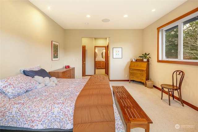 bedroom featuring recessed lighting, light colored carpet, and baseboards