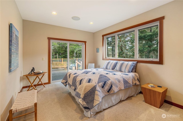 carpeted bedroom with baseboards, recessed lighting, and access to exterior