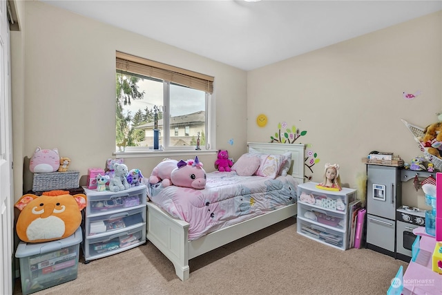 bedroom with light carpet