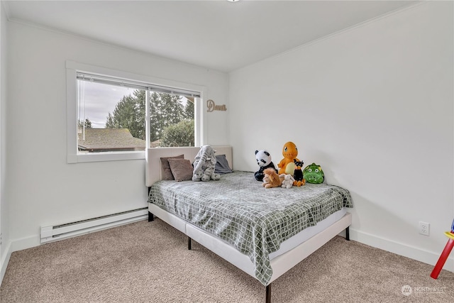 carpeted bedroom featuring baseboard heating