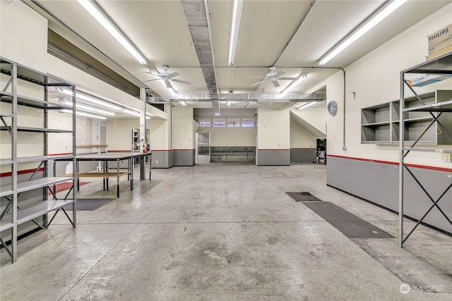 basement with ceiling fan