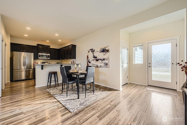 dining room featuring light hardwood / wood-style floors