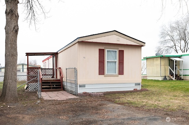 view of property exterior featuring a yard