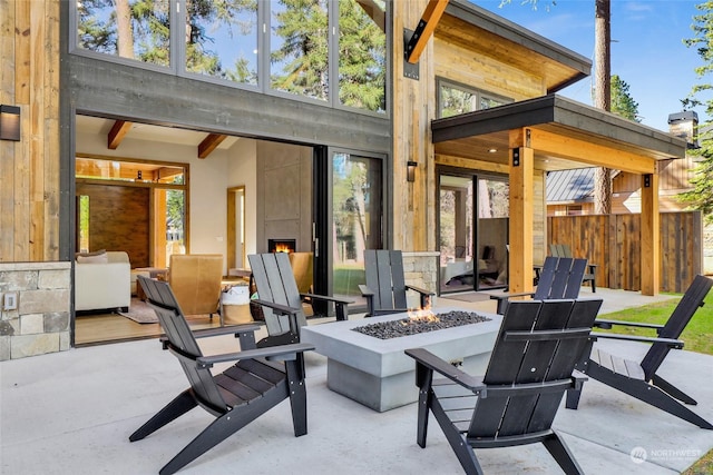 view of patio featuring a fire pit