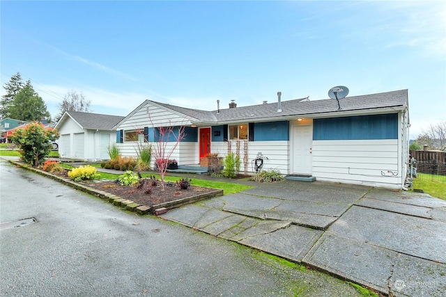 single story home featuring a garage