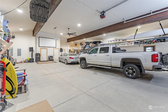 garage with ceiling fan, a garage door opener, and electric panel