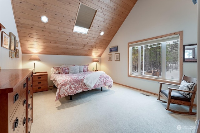 bedroom with wood ceiling, light carpet, and vaulted ceiling