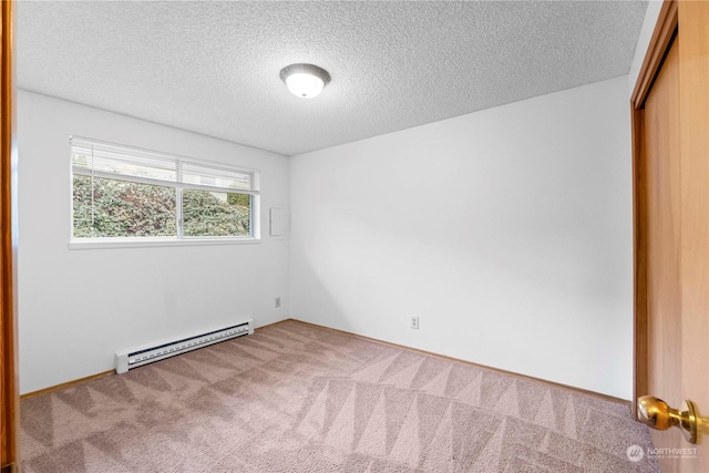 unfurnished bedroom with carpet, a textured ceiling, a baseboard radiator, and a closet