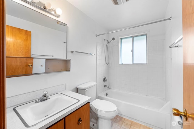 full bathroom featuring vanity, toilet, and tiled shower / bath