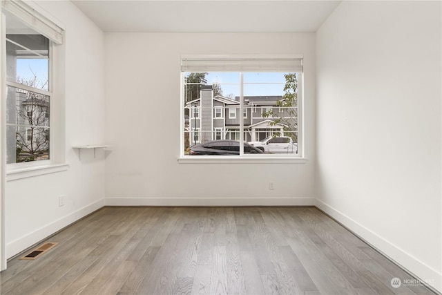 empty room featuring light hardwood / wood-style flooring