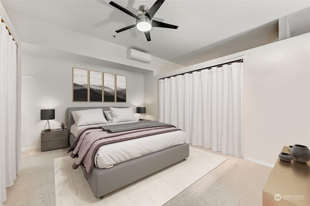 carpeted bedroom with a wall mounted air conditioner and ceiling fan