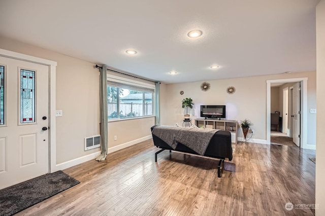 living room with wood-type flooring