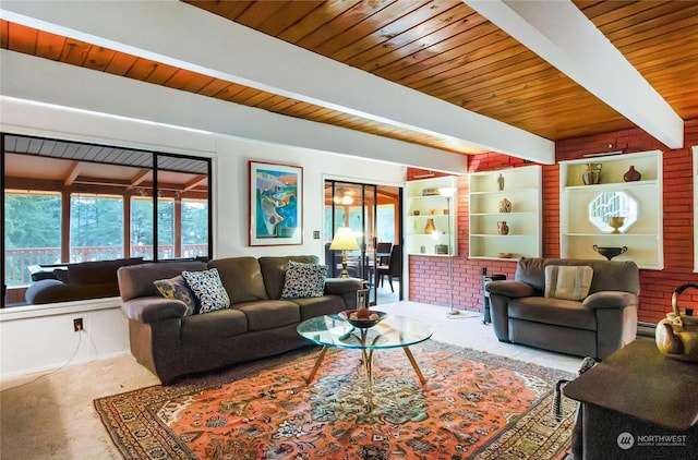 carpeted living room with beamed ceiling and wooden ceiling