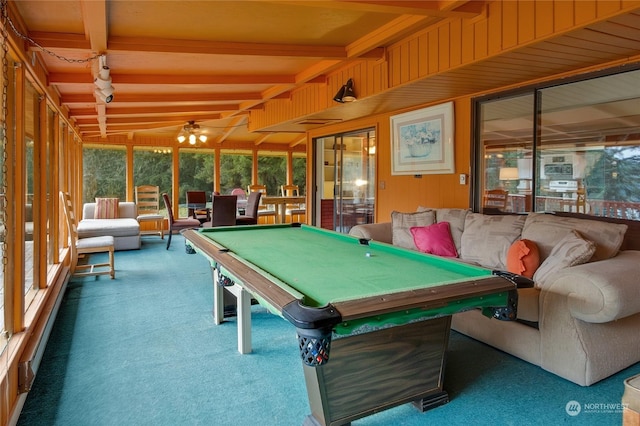 game room featuring lofted ceiling with beams, carpet, wood walls, and billiards