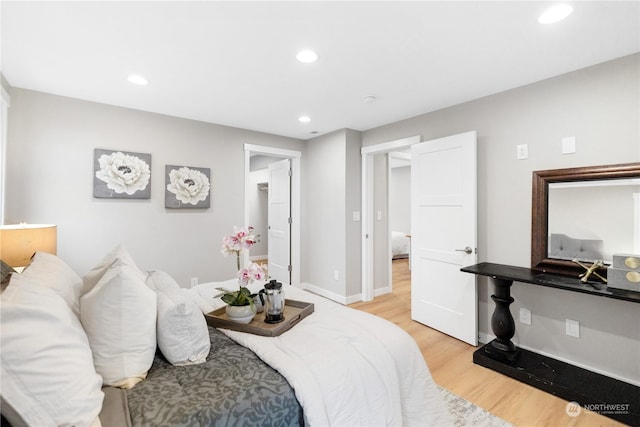 bedroom featuring light hardwood / wood-style floors