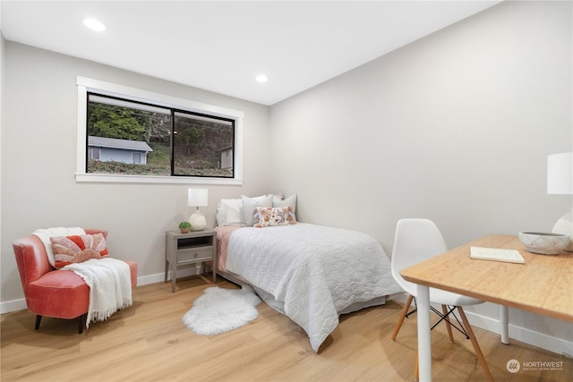 bedroom featuring hardwood / wood-style flooring