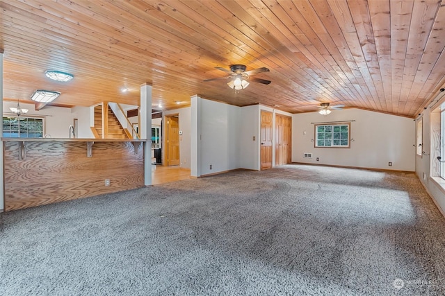 unfurnished living room featuring light carpet, wood ceiling, and lofted ceiling