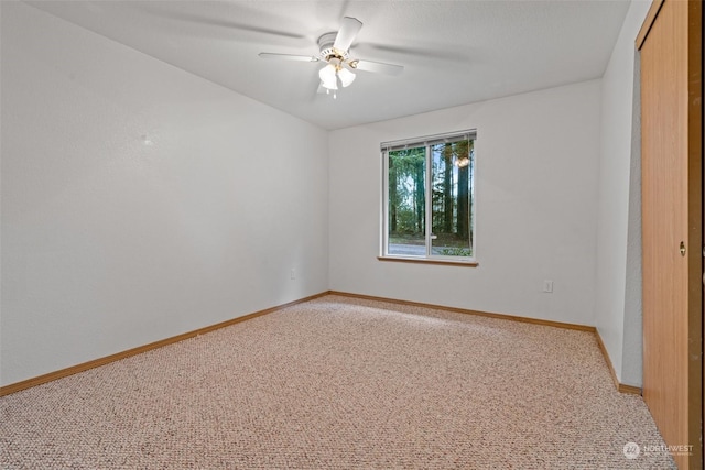 interior space featuring ceiling fan