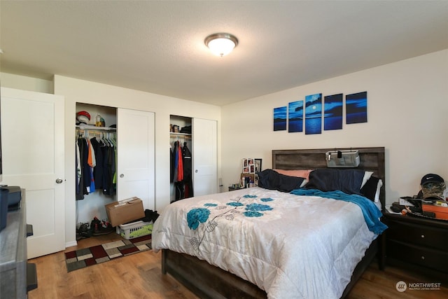 bedroom with hardwood / wood-style flooring