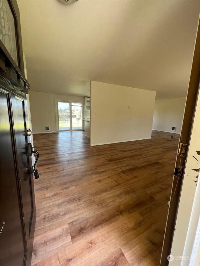 interior space with hardwood / wood-style floors