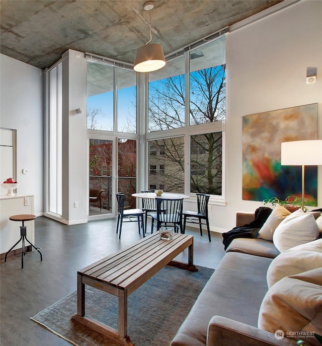 living room with a high ceiling