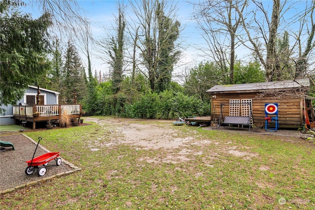 view of yard with a deck