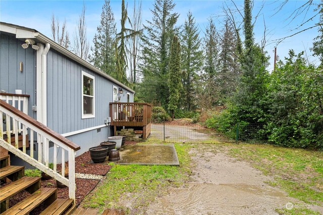 view of yard featuring a deck