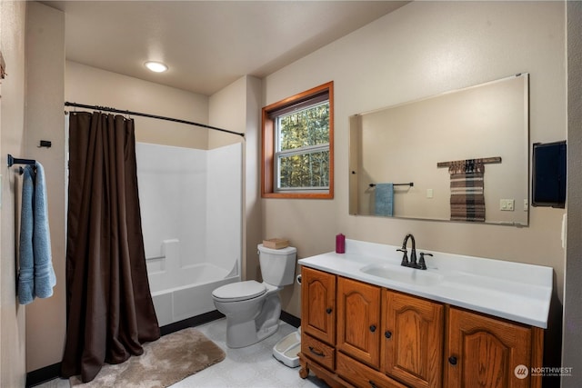 full bathroom featuring toilet, shower / tub combo, and vanity