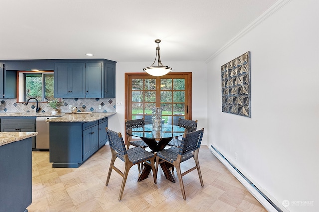 dining space with baseboard heating, crown molding, and recessed lighting