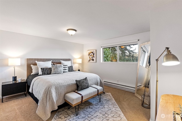 bedroom featuring baseboard heating and carpet flooring