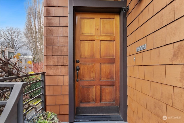 doorway to property featuring a balcony