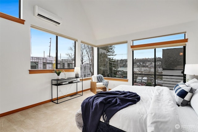 carpeted bedroom featuring lofted ceiling and a wall unit AC