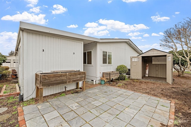 back of house featuring a patio