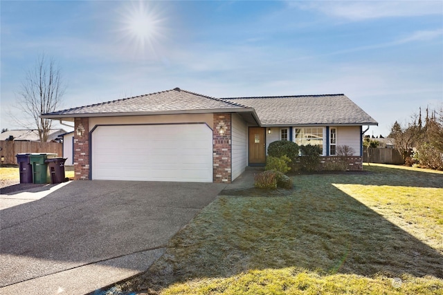 ranch-style house with a garage and a front yard