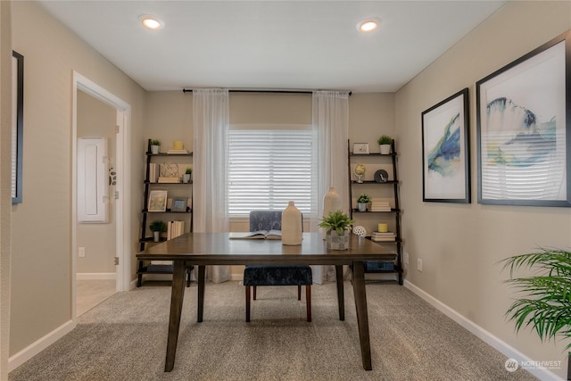 office space with light colored carpet